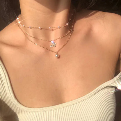 Endearing Three Layer Three Pendant Golden Metal Necklace